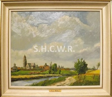 Clocher de l'église de Comines dans le paysage
